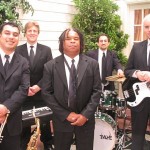 Musicians (including John Sawoski) on camera on the movie Rumor Has It.