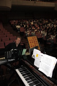 John Sawoski at the keyboard in Jinan, China.